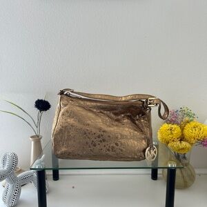 Elegant Michael Kors Gold Metallic shoulder bag MK